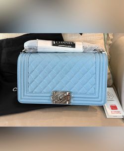 New! CC beautiful blue quilted purse- dust bag included. See description