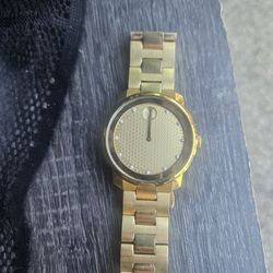 Movado bold gold watch with diamonds