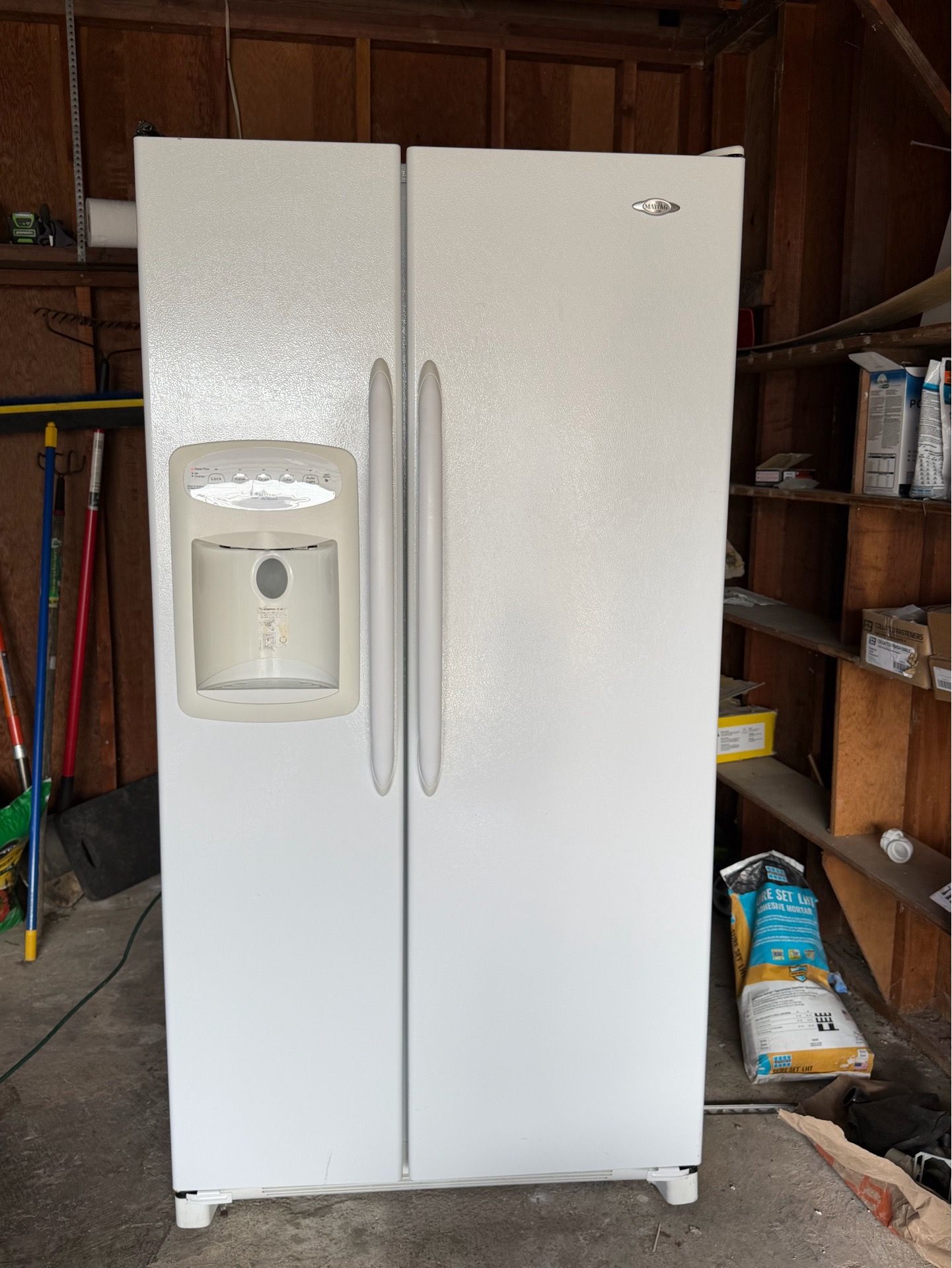 Maytag side by side refrigerator with water/ice maker