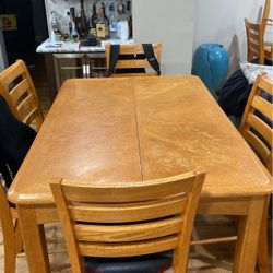Solid Wooden Kitchen Table comes with 8 Chairs, Leaf Extension  & Big lazy Susan for middle.