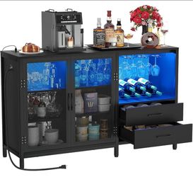 wine/liquor bar cabinet with a charging station, LED lights.