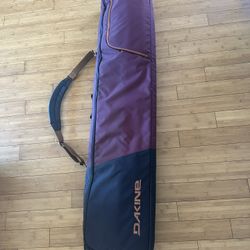 Arbor Rocker Snowboard and Dakine Snowboard Bag 