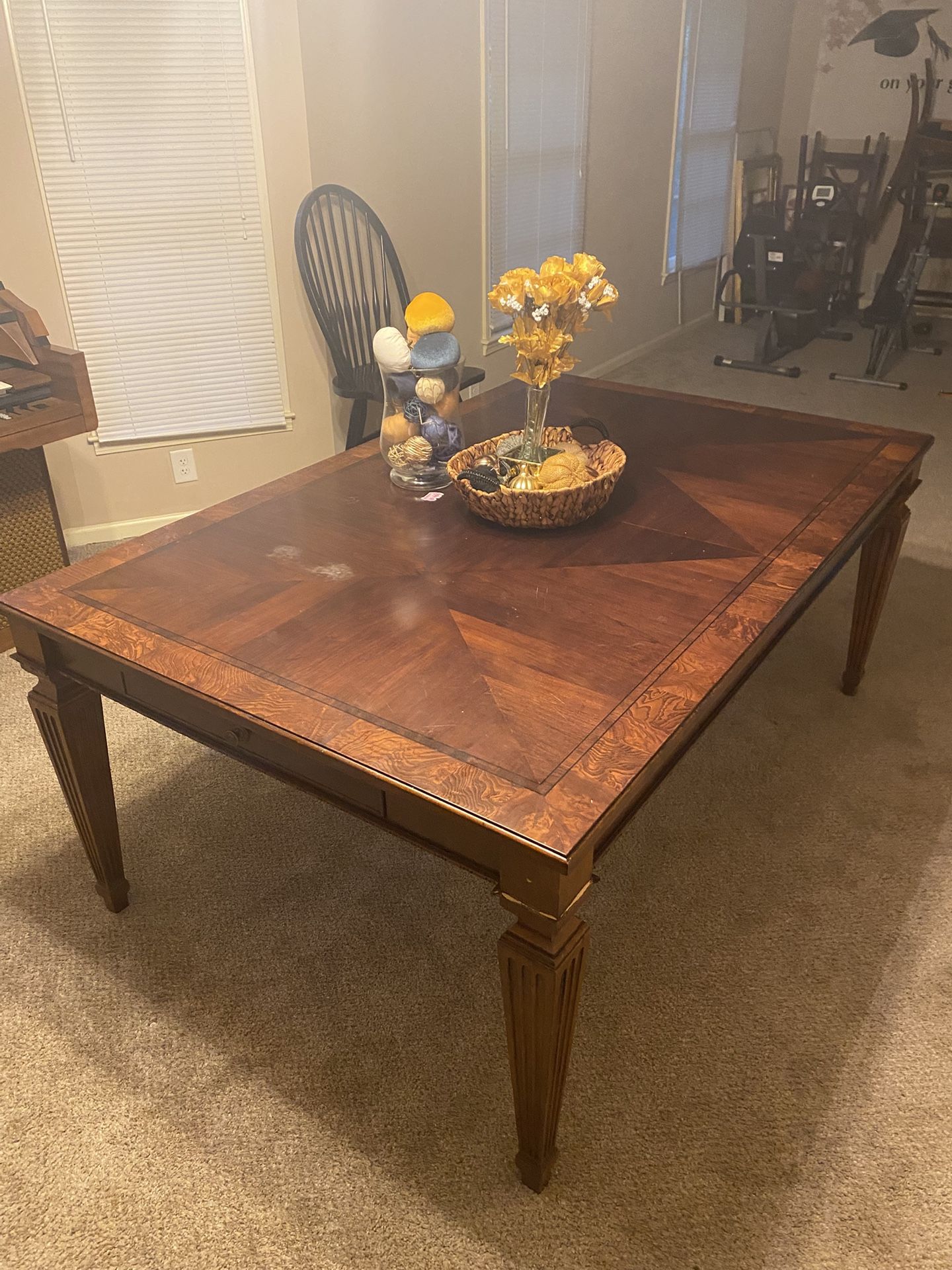 Wooden dining room table with matching chairs
