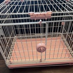 pink dog cage 