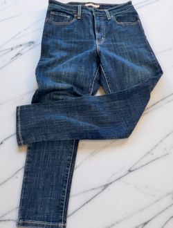 Levi's Stone Wash Blue Denim Jeans with Contrast Stitching