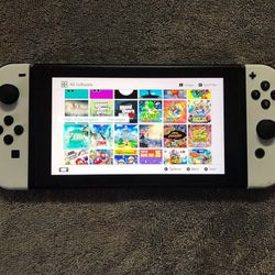 NINTENDO SWITCH V1 with 125 POPULAR SWITCH GAMES