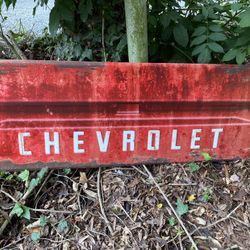 New Chevrolet tailgat sign red 45”x16”  This is a new repro, not vintage. Made of metal no porcelain. Driveway pick up only, no delivery or meetups. W