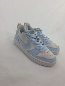 Size 4- low blue Nike