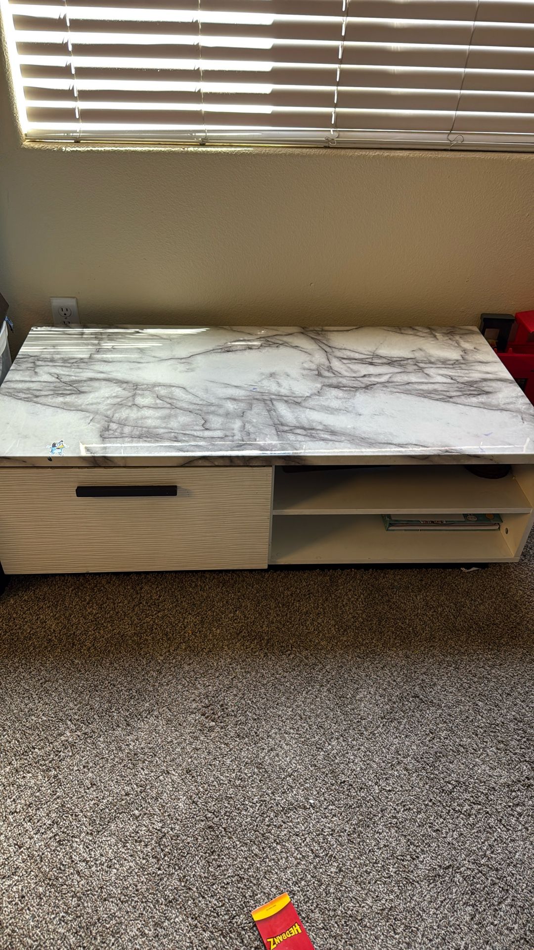 Coffee Table With A Granted Top