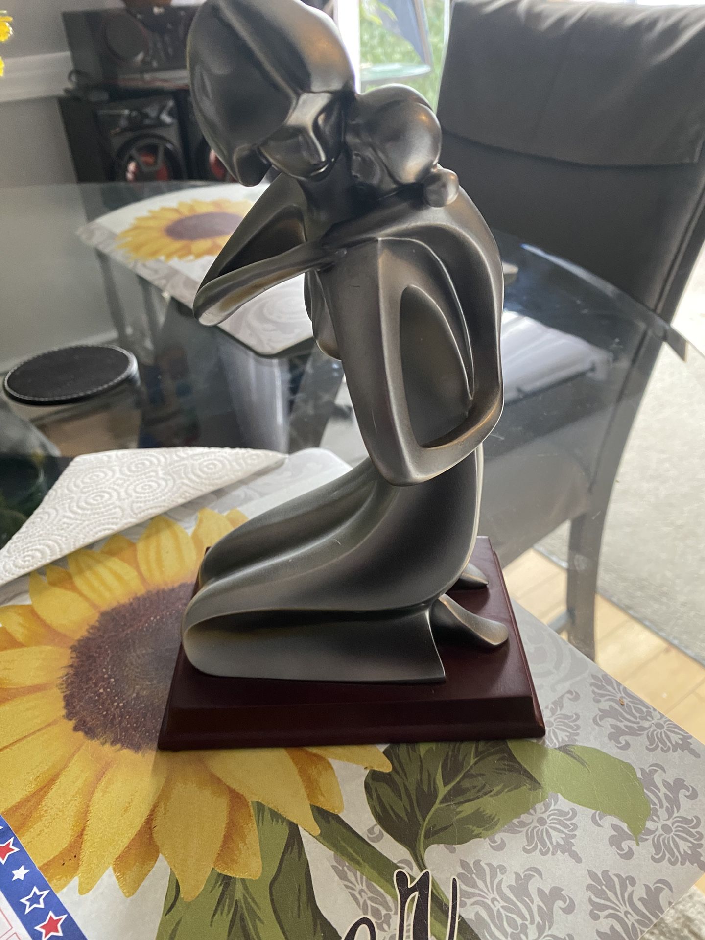 Beautiful silver statue, mother, and daughter