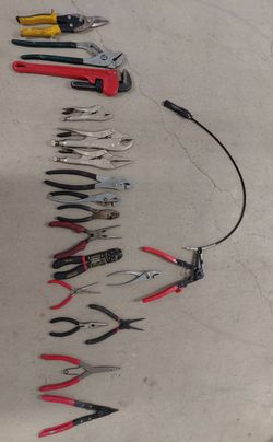 assortment lock pliers hose pliers wire strip pliers  needle  nose