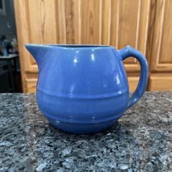 Vintage Grandmillenial Blue Stoneware Pitcher.  Size appropriate 4 1/2 inches tall.  Preowned.  Has been on display in a cabinet.  Smoke free home  