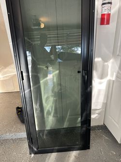 Black Aluminum RV Interior Glass Door with Frame by Lippert Components