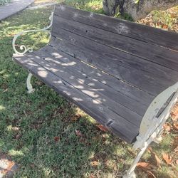 Wrought iron and redwood bench