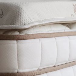 Pillow top full mattress with extra pads
