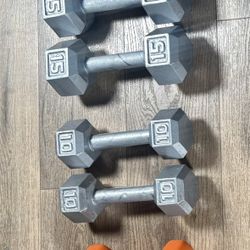 Sets of Hex Dumbbells Cast Iron in NEW Condition: Pairs of 5s, 8s, 10s, 15s and 20s. 