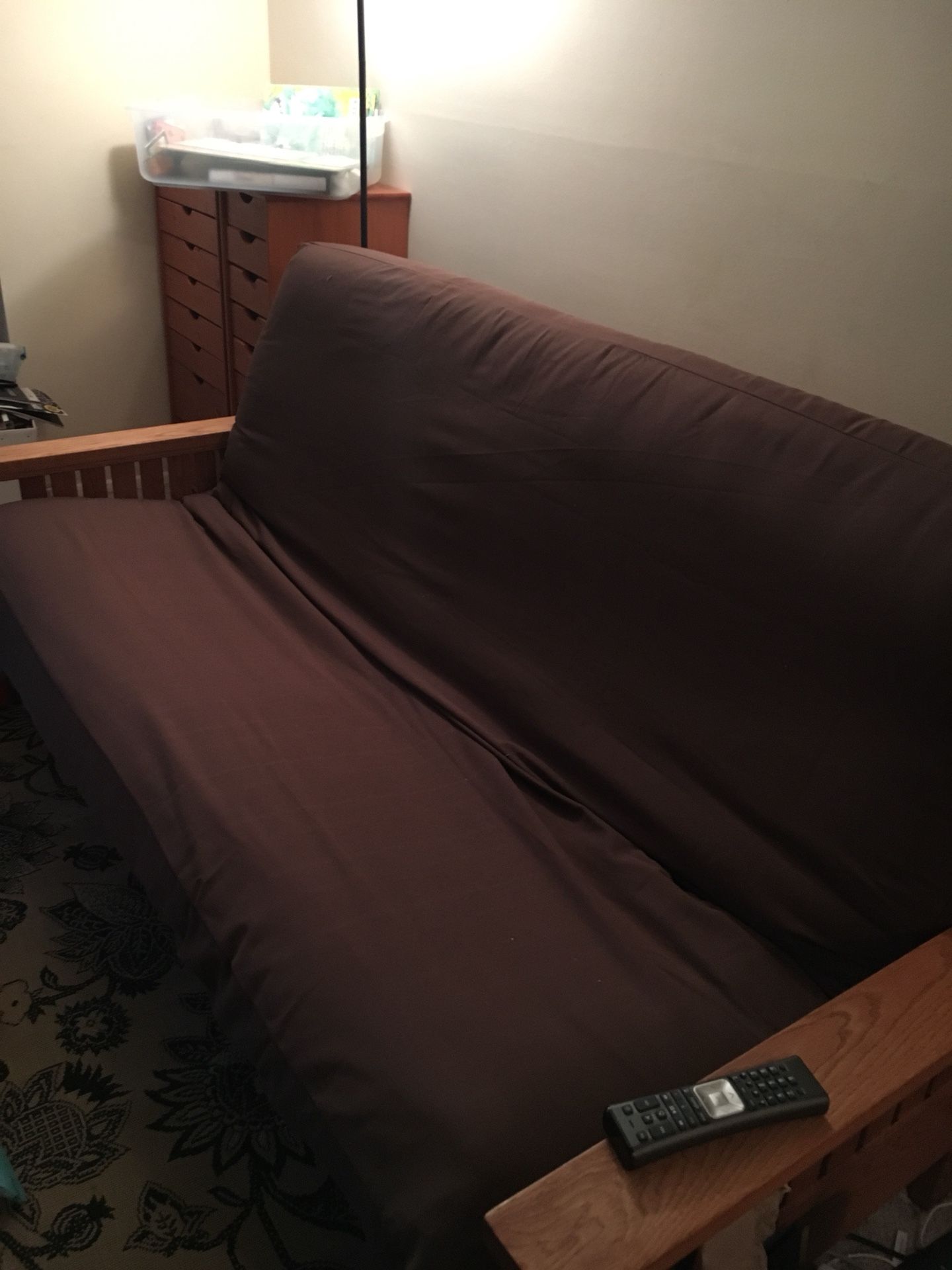 Oak Futon. Will disassemble for easy moving