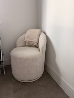 Modern textured swivel chair