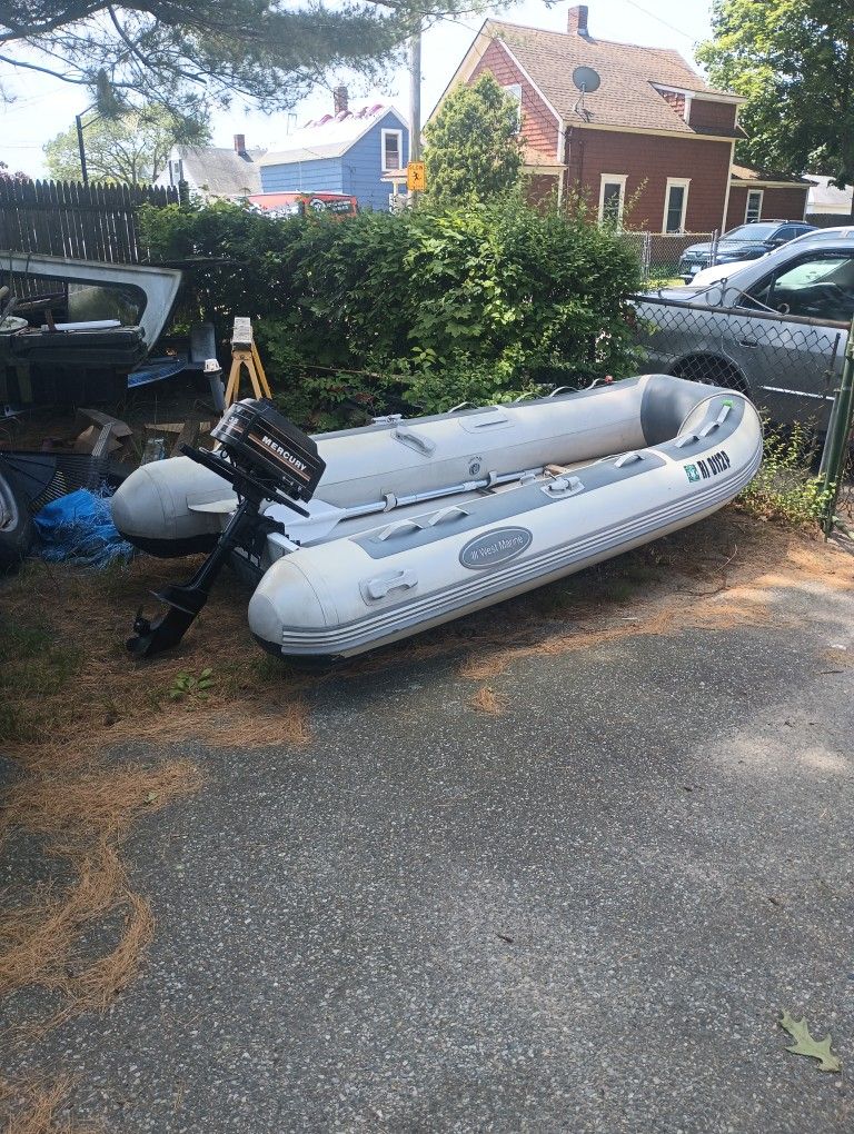 West Marine 12 Foot Fiberglass Bottom With 3.5 Mercury With Oars And Lifejackets