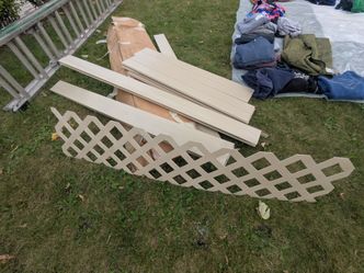 Fence 100ft of paneling beige color. Boxed and new