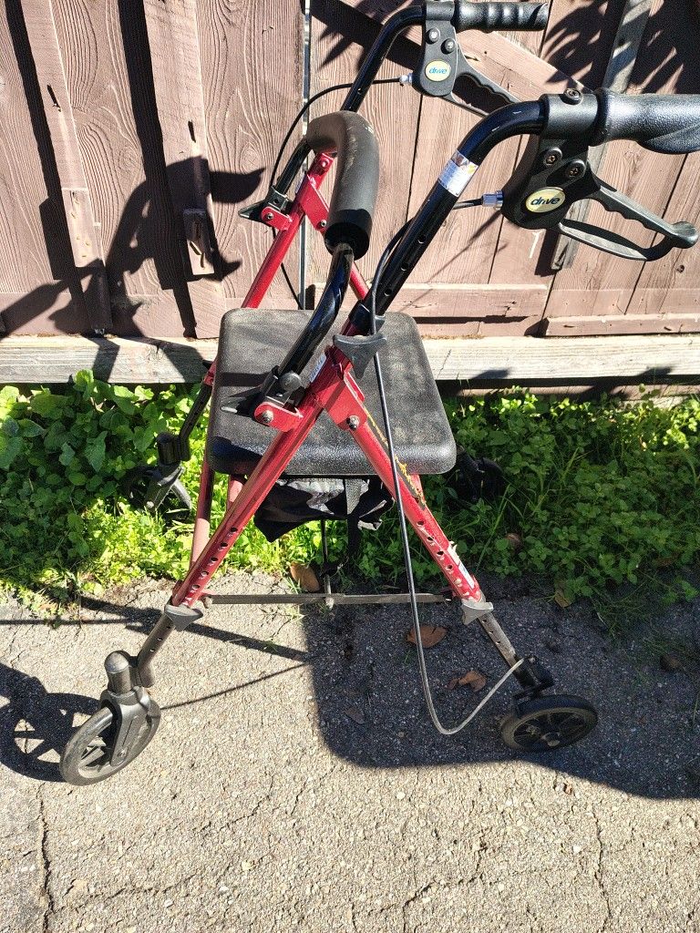 Walker With Storage Compartment