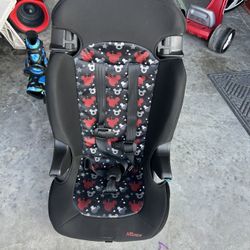 Kids Finale 2-in-1 Booster Car Seat with a Mickey Mouse design. 