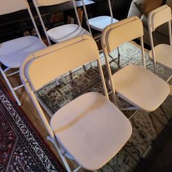 New foldable  chairs plus a free table cover