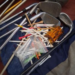 Golf Clubs Tees And Balls