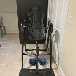 Strong Teeter Inversion Table ; Folds Neatly Upright.  