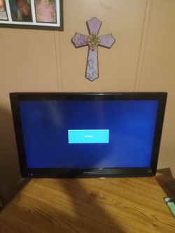32 to 40 flat screen wall mount TV in good condition  no remote 