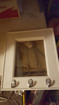 Nice mirror with hooks for keys or necklaces10 firm