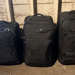 4 Black Suitcases - Swiss/Eagle Creek