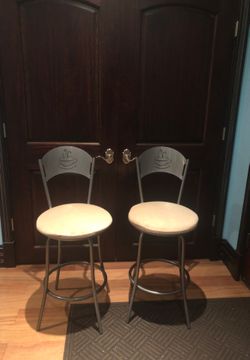 Metal swivel barstool with cushioning
