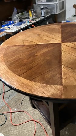 Round table with two shelves counter height