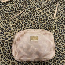 Michael Kors Jet Set crossbody bag in a rose gold-tone 