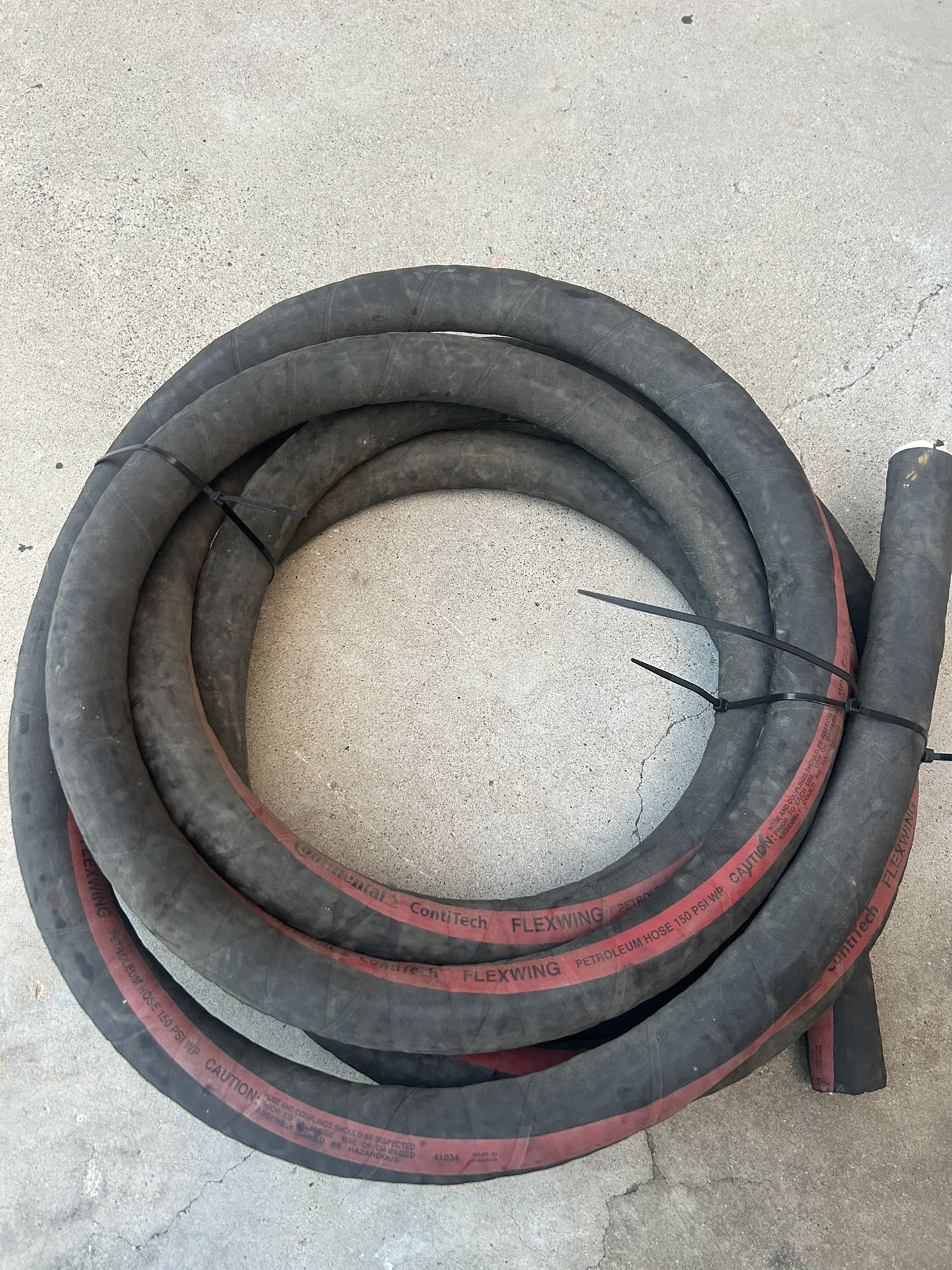 Never Used 1 1/4 Continental Flex Wing Petroleum Hose