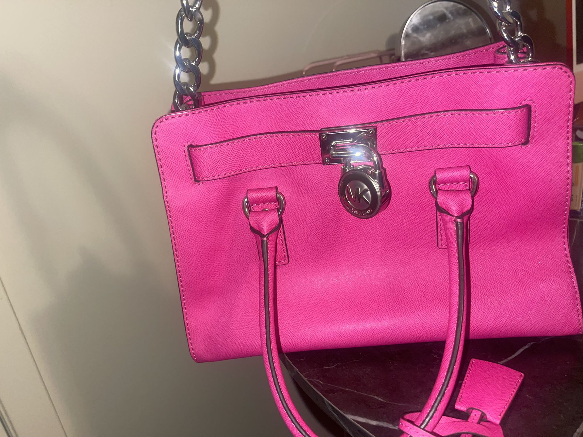 Hot pink Michael Kors bag with gold hardware. Mint condition.