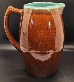 This is a vintage John B. Taylor Zanesville Pottery Country Fare pitcher