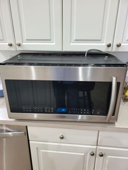 Samsung over the range microwave.  Near 157 ave and sw 144 st