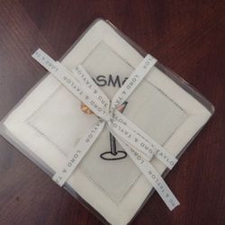 Embroidered Cocktail Coasters, 4, By Lord & Taylor. The packaging is yellowed due to aging plastic, but the coasters are white and new.