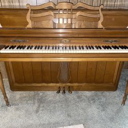 Antique Piano With Wheels  and Antique Books