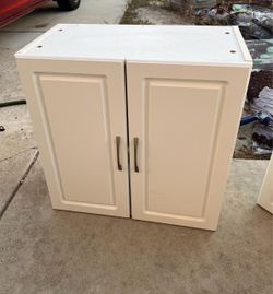 2 White Double-Door Wall Cabinets