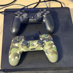 PS4 1TB W/2 Controllers. 