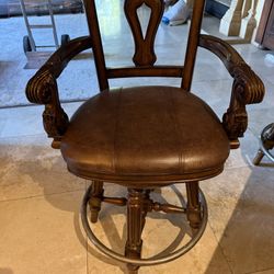 5 wooden swivel bar stools $100 each