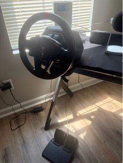 Thrustmaster steering wheel and pedals PS5
