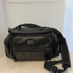 black leather Case Logic brand camera bag featuring multiple zipper