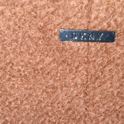 Brand.\n New never worn DK. And y beautiful.