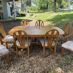 Solid Oak Table W/ 8 Chairs & 2 Leaves