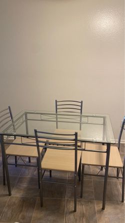 Glass table with chairs