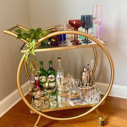 gold circular bar cart